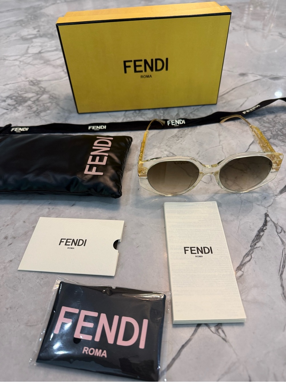 Fendi Clear Frame Sunglasses w branded lens cleaner, case and box